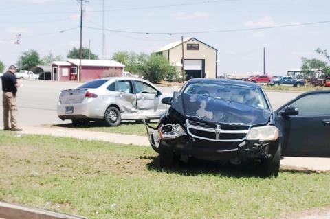 A Dodge Avenger and a Ford Focus collided