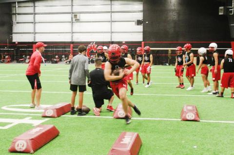 Brownfield football opens with midnight conditioning
