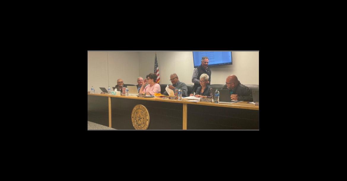 Commissioners Open Sealed Bids for Trucks
